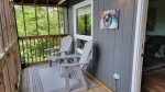 Enjoy cool mountain breezes from the screened in porch